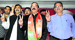 Kavinder Gupta (extreme right), Ajatshatru (centre) with state BJP president Jugal Kishore Sharma in Jammu on Saturday