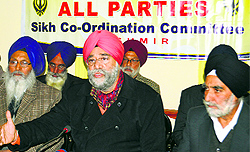 Jagmohan Singh Raina, chairman, All-Parties Sikh Coordination Committee, addresses a press conference in Srinagar on Saturday