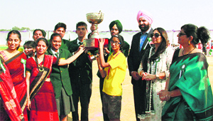 Cabinet Minister Bikram Singh Majithia along with winners of a sporting event at Delhi Public School in Khanna.