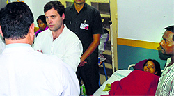 Congress vice-president Rahul Gandhi inquires about the health of victims at a hospital in Bilaspur on Saturday.