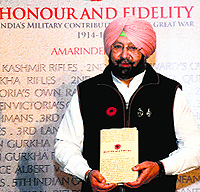 Former Punjab CM Capt Amarinder Singh with his book Honour and Fidelity in New Delhi.
