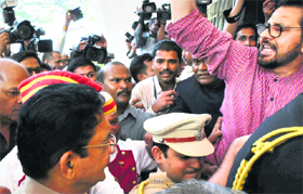 Congress MLAs demonstrate against the BJP government at the Vidhan Bhavan in Mumbai.