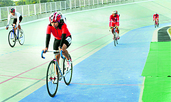 Cyclists during the practice session prior to the final of the All-India Inter-University Track Cycling (MW) Championship at GNDU in Amritsar on Sunday
