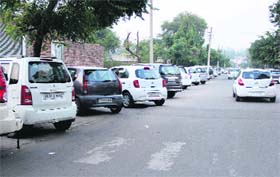 Vehicles parked in the no-parking area in Panchavati Nagar Road right next to the Mittal Mall in Bathinda