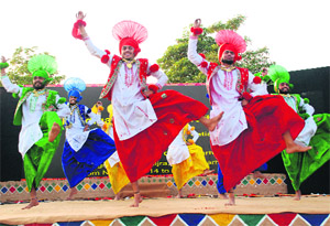 Artistes perform during the National Crafts Mela at Kala Gram on Sunday