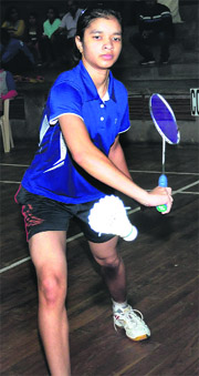 Ishita returns a shot at Panjab University in Chandigarh on Sunday
