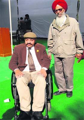 ArriveSAFE NGO president wheelchair-bound Harman Sidhu along with his father Ajaib Singh Sidhu on the occasion in Jalandhar