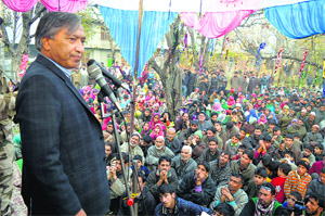 Kulgam MLA and CPM state secretary Mohammad Yousuf addresses supporters during an election rally in Kulgam district on Sunday.