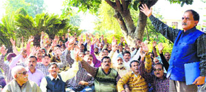 National Mazdoor Conference president Subash Shastri addresses a rally of activists in Jammu on Sunday.