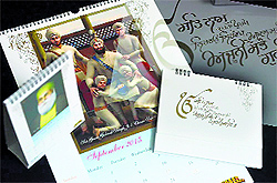 Kamaljeet Kaur's works in calligraphy embossed on calendars and a gold-plated sword