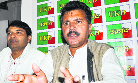 UKD (Airy) officiating president Harish Pathak addresses mediapersons at the party office in Dehradun on Saturday.