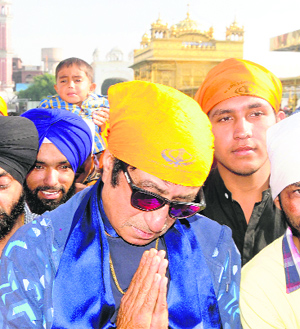 Bollywood actor Shakti Kapoor pays obeisance at the Golden Temple in Amritsar on Monday.