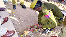 A constable collects live cartriges near the Chandigarh railway station on Monday. 