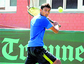 Eklavya Singh in action during a tennis match in Chandigarh. 