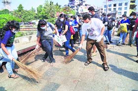 Sweeping away apathy: College students in Mumbai participate in the Swachch Bharat Abhiyan, which requires micro planning