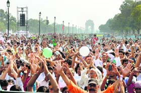 People take a pledge at Rajpath, New Delhi, during the launch of the campaign
