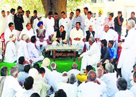 Leader of Opposition Abhay Chautala addresses people at Bakrianwali village in Sirsa district on Monday