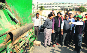 Local Bodies Minister Anil Joshi at a garbage dump site in Jalandhar on Monday