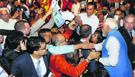 Prime Minister Narendra Modi meets people after his address at Allphones Arena in Sydney on Monday.