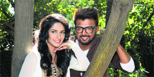 Singer Er Nitish poses with a model