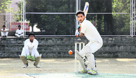 A player in action during a match at the DDCSA Senior Boys Cricket Tournament at St Josephs Academy in Dehradun on Monday.