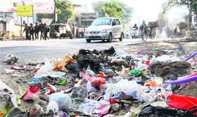 Heaps of garbage lying unattended on a road in Dehradun on Monday.