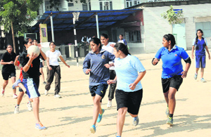 Students of various schools in action during the netball trial at St Xaviers School in Bathinda on Tuesday. 