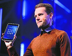 Sebastian Nystrom, head of product business at Nokia Technologies, presents N1, Nokias new Android tablet, at the Slush 2014 event in Helsinki on Tuesday. It will be available for $249.
