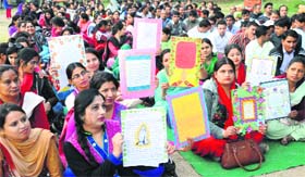 Teachers during a campaign at Masjid Ground, Chandigarh, on Tuesday