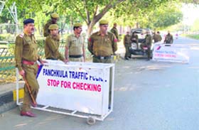 Policemen at a naka at the MDC in Panchkula on Tuesday