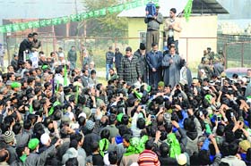 Clarion call: PDP leader Muzaffar Hussain Beigh addresses a poll rally at Shadgund Sonwari in Bandipora on Tuesday