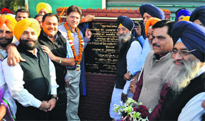 Sharanjit Singh Dhillon, Punjab Irrigation Minister, inaugurates a pedestrian underpass at Aggar Nagar in Ludhiana on Tuesday