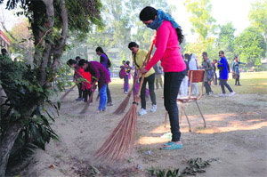Students take part in a cleanliness drive at the Khalsa College for Women in Ludhiana.