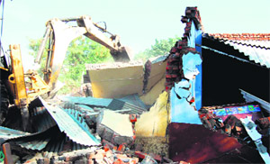 An anti-encroachment drive underway at BHEL township in Haridwar on Tuesday
