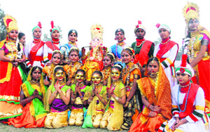 Students of Guru Nanak Inter College, Rudarpur, wait for Chief Minister Harish Rawat during the inaugural ceremony of the 60th National School Volleball Tournament in Dehradun on Tuesday