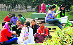 Students of BBK DAV College for Women enjoy sunshine amidst the cold wave in Amritsar on Wednesday
