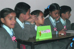 Students take part in a spell bee competition at Tribune Model School in Chandigarh on Wednesday