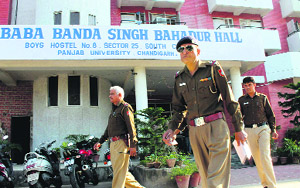 Policemen at the Hostel Number 8 where a clash took place between students at Panjab University, Chandigarh