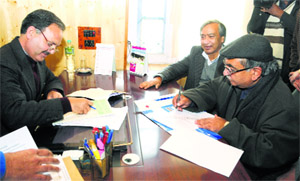 Democratic Party (Nationalist) chief Ghulam Hassan Mir files his nomination papers on Wednesday