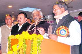 Chief Minister Harish Rawat addresses a gathering at a a programme of Forest Department employees in Dehradun on Wednesday