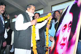 Chief Minister Harish Rawat pays floral tributes on a photo graph of former Prime Minister Indira Gandhi on her birth anniversary at Ranikhet on Wednesday