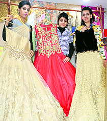 Sargun Seth and Kanika Madaan show their latest wedding collection at a design studio in Amritsar on Thursday