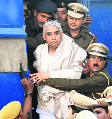 Rampal at the Panjab and Haryana High Court on Thursday. He was brought to the court amid tight security.