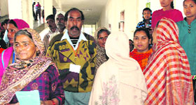 Patients wait for treatment at the General Hospital, Sector 6, Panchkula, on Thursday.