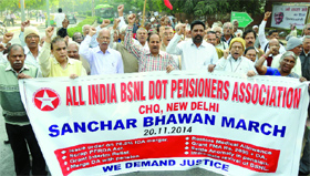 Members of the All India BSNL Dot Pensioners Association raise slogans as they march towards Sanchar Bhawan from Ramlila Grounds, clamouring for the restoration of medical allowance, among other demands, in New Delhi on Thursday.