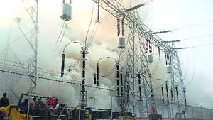Smoke emanates from the Uri II power house in Baramulla on Thursday.