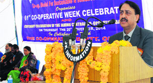 Ramesh Kumar Koul, Secretary to Government, Cooperatives Department, addresses a gathering during the Cooperative Week celebrations in Jammu on Thursday.
