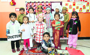 Children dressed as community helpers at Maple Bear Canadian Playway and Nursery School in Ludhiana.