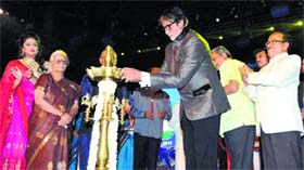 Actor Amitabh Bachchan lights a lamp to inaugurate the 45th International Film Festival of India 2014 in Panaji on Thursday