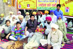 For a better life: Rural watchmen on a dharna in Sangrur on Thursday